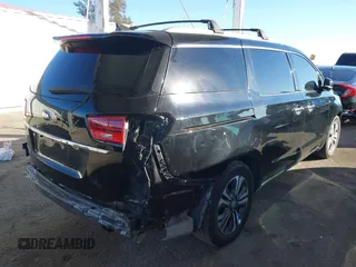 2021 Kia Sedona EX with VIN KNDMC5C10M6671729, listed as a IAAI auction lot 40858206 with 58,775 mi miles. Bid and sale history available at carsss.com. Image 4.