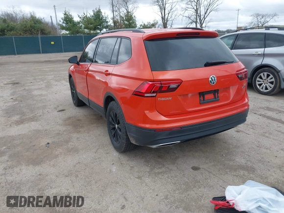 2018 Volkswagen Tiguan S with VIN 3VV0B7AX4JM124500, listed as a IAAI auction lot 41974671 with 76,970 mi miles and . Bid and sale history available at DreamBid. Image 3.