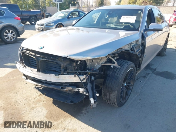 2015 BMW 7 Series 750Li with VIN WBAYE8C55FD782384, listed as a IAAI auction lot 41319363 with 75,784 mi miles. Bid and sale history available at carsss.com. Image 6.