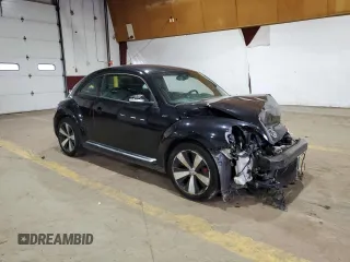 2014 Volkswagen Beetle Turbo R-Line with VIN 3VWVT7ATXEM665178, listed as a Copart auction lot 75652044 with Not Provided miles and Salvage Title. Bid and sale history available at DreamBid. Image 4.