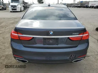 2016 BMW 7 Series 740i with VIN WBA7E2C51GG546677, listed as a Copart auction lot 63455445 with 106,553 mi miles and Salvage title. Bid and sale history available at DreamBid. Image 6.