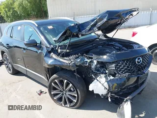 2023 Mazda CX-50 Meridian Edition z VIN 7MMVABXY1PN149136, wystawiony jako IAAI lot #42587764 z przebiegiem 4 748 mil mil oraz . Historia ofert i sprzedaży dostępna na DreamBid. Obrazek 6.