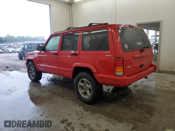 1998 Jeep Cherokee Sport with VIN 1J4FJ68S7WL148034, listed as a Copart auction lot 52436475 with 80,239 mi miles and Salvage Title. Bid and sale history available at carsss.com. Image 2.