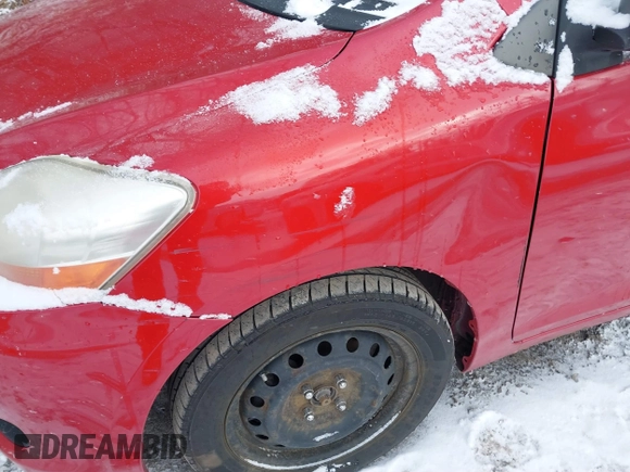 2009 Toyota Yaris with VIN JTDBT903191338948, listed as a IAAI auction lot 41630265 with 230,360 mi miles. Bid and sale history available at carsss.com. Image 12.