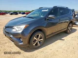 2018 Toyota RAV4 XLE with VIN JTMWFREV1JD128081, listed as a Copart auction lot 56843435 with 112,722 mi miles and Salvage title. Bid and sale history available at DreamBid. Image 1.