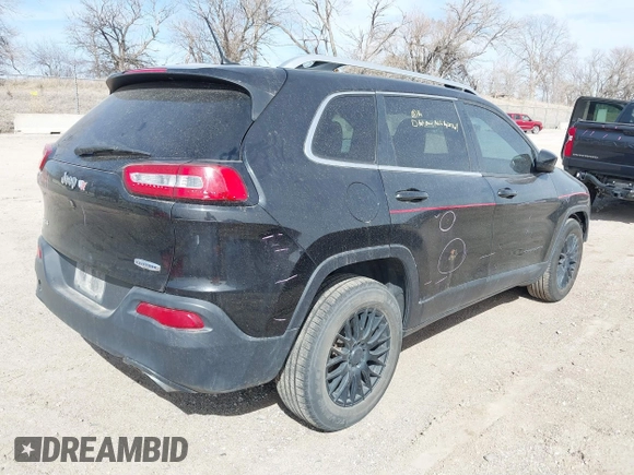 2015 Jeep Cherokee North with VIN 1C4PJMCS7FW544792, listed as a IAAI auction lot 41801573 with 140,575 mi miles. Bid and sale history available at carsss.com. Image 4.