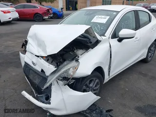 2019 Toyota Yaris Sedan L with VIN 3MYDLBYVXKY507258, listed as a IAAI auction lot 41890588 with 1 mi miles. Bid and sale history available at carsss.com. Image 16.