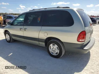 1999 Dodge Caravan SE with VIN 1B4GP44G5XB904043, listed as a Copart auction lot 77331804 with 105,141 mi miles and Clean Title. Bid and sale history available at carsss.com. Image 2.