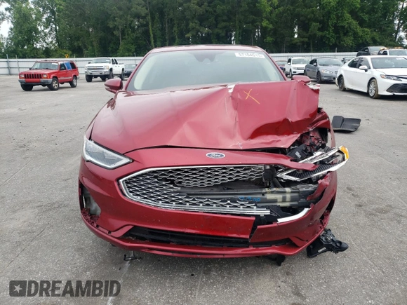 2019 Ford Fusion Titanium z VIN 3FA6P0D99KR221328, wystawiony jako Copart lot #57104515 z przebiegiem 138 427 mil mil oraz Szkoda całkowita • Salvage title. Historia ofert i sprzedaży dostępna na DreamBid. Obrazek 5.