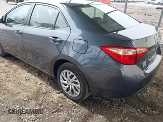 2019 Toyota Corolla L with VIN 2T1BURHE6KC125269, listed as a IAAI auction lot 42082877 with 106,308 mi miles and . Bid and sale history available at carsss.com. Image 3.
