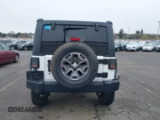 2014 Jeep Wrangler Unlimited Rubicon with VIN 1C4BJWFGXEL283929, listed as a IAAI auction lot 41812052 with 137,790 mi miles and . Bid and sale history available at DreamBid. Image 16.