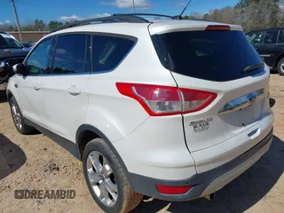 2013 Ford Escape SEL with VIN 1FMCU0HX0DUC07372, listed as a IAAI auction lot 41740884 with 96,436 mi miles and . Bid and sale history available at DreamBid. Image 3.