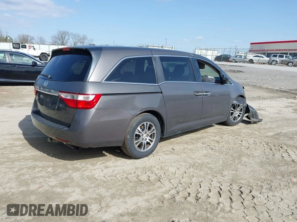 2013 Honda Odyssey EX-L with VIN 5FNRL5H62DB035649, listed as a IAAI auction lot 41849123 with 176,392 mi miles and . Bid and sale history available at carsss.com. Image 4.