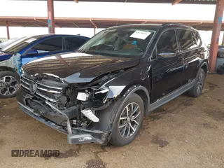 2018 Volkswagen Tiguan SEL z VIN 3VV3B7AX1JM036551, wystawiony jako IAAI lot #42170151 z przebiegiem 97 506 mil mil oraz . Historia ofert i sprzedaży dostępna na DreamBid. Obrazek 2.