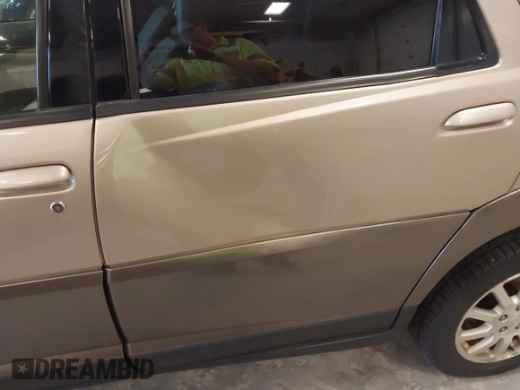 2005 Buick Rendezvous with VIN 3G5DA03E45S567826, listed as a IAAI auction lot 42124723 with 299,634 mi miles and . Bid and sale history available at DreamBid. Image 12.