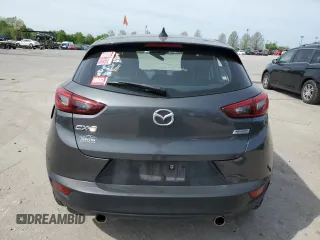 2018 Mazda CX-3 Touring z VIN JM1DKDC7XJ0300125, wystawiony jako Copart lot #54553765 z przebiegiem 83 652 mil mil oraz Szkoda całkowita • Salvage title. Historia ofert i sprzedaży dostępna na DreamBid. Obrazek 6.