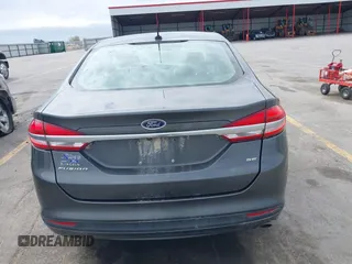 2017 Ford Fusion SE with VIN 3FA6P0H7XHR228922, listed as a IAAI auction lot 42162345 with 186,000 mi miles and . Bid and sale history available at DreamBid. Image 16.