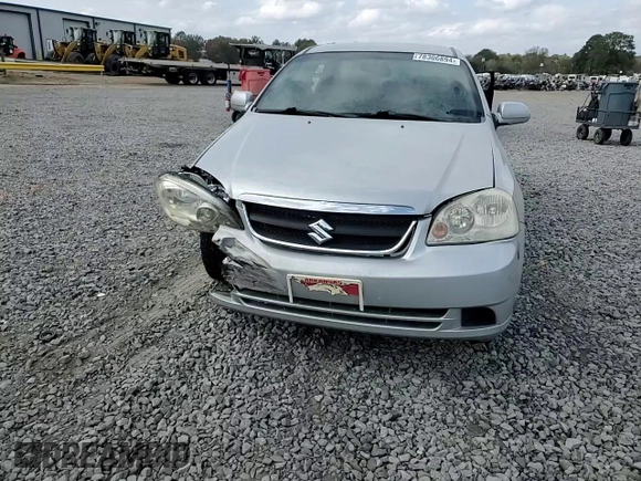 2006 Suzuki Forenza z VIN KL5JD56Z96K362651, wystawiony jako Copart lot #78306894 z przebiegiem 167 916 mil mil oraz Tytuł czysty. Historia ofert i sprzedaży dostępna na DreamBid. Obrazek 11.