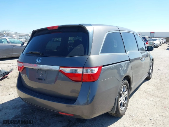 2013 Honda Odyssey EX with VIN 5FNRL5H4XDB061284, listed as a IAAI auction lot 41771229 with 150,118 mi miles. Bid and sale history available at carsss.com. Image 4.