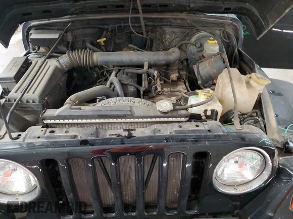 1997 Jeep Wrangler Sport with VIN 1J4FY19S6VP457417, listed as a Copart auction lot 52110535 with 106,129 mi miles and Salvage Title. Bid and sale history available at carsss.com. Image 12.