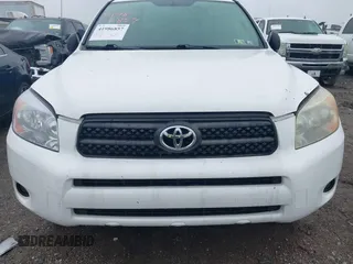 2006 Toyota RAV4 with VIN JTMBD33VX65015543, listed as a IAAI auction lot 41986857 with 124,709 mi miles. Bid and sale history available at carsss.com. Image 6.