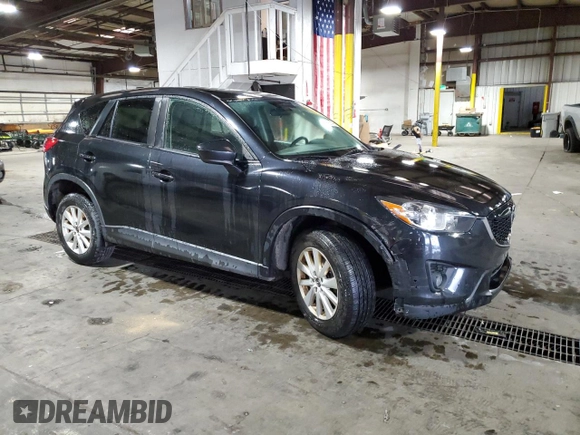 2013 Mazda CX-5 Touring with VIN JM3KE4CE8D0121607, listed as a Copart auction lot 56217965 with 143,861 mi miles and Clean Title. Bid and sale history available at DreamBid. Image 4.