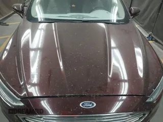 2017 Ford Fusion SE with VIN 3FA6P0H92HR105567, listed as a IAAI auction lot 42174324 with 123,443 mi miles and . Bid and sale history available at DreamBid. Image 10.