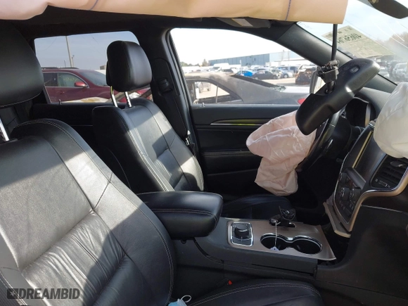 2014 Jeep Grand Cherokee Limited with VIN 1C4RJFBG4EC579551, listed as a IAAI auction lot 40656764 with 132,080 mi miles. Bid and sale history available at carsss.com. Image 5.
