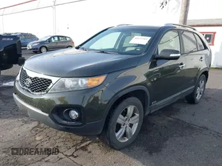 2012 Kia Sorento EX with VIN 5XYKUCA68CG275924, listed as a IAAI auction lot 41623363 with 173,078 mi miles. Bid and sale history available at carsss.com. Image 2.
