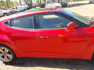 2012 Hyundai Veloster w/Gray Int z VIN KMHTC6AD0CU048339, wystawiony jako IAAI lot #42040008 z przebiegiem 117 895 mil mil oraz . Historia ofert i sprzedaży dostępna na DreamBid. Obrazek 14.