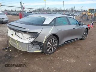 2023 Lucid Air Touring with VIN 50EA1TEAXPA004884, listed as a IAAI auction lot 41465547 with 18,051 mi miles. Bid and sale history available at carsss.com. Image 4.