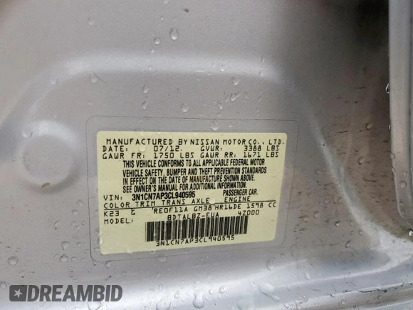 2012 Nissan Versa SV z VIN 3N1CN7AP3CL940595, wystawiony jako Copart lot #60862945 z przebiegiem 144 886 mil mil oraz Szkoda całkowita • Salvage title. Historia ofert i sprzedaży dostępna na DreamBid. Obrazek 12.