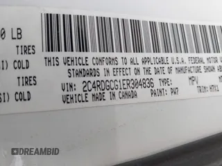 2014 Dodge Grand Caravan SXT with VIN 2C4RDGCG1ER304836, listed as a IAAI auction lot 42049558 with 186,831 mi miles and . Bid and sale history available at DreamBid. Image 9.
