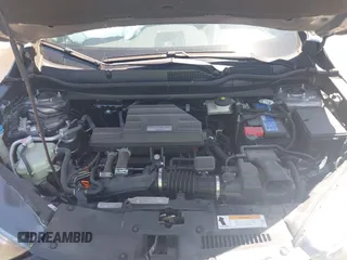 2020 Honda CR-V LX with VIN 7FARW1H26LE002413, listed as a IAAI auction lot 42318905 with 63,698 mi miles and . Bid and sale history available at DreamBid. Image 10.
