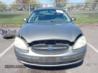 2002 Ford Taurus SE Standard with VIN 1FAFP53U02A215964, listed as a IAAI auction lot 42063534 with 187,424 mi miles and . Bid and sale history available at DreamBid. Image 6.