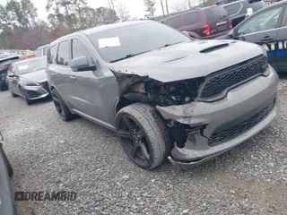 2021 Dodge Durango GT Plus with VIN 1C4RDHDG8MC639748, listed as a IAAI auction lot 41623021 with 104,686 mi miles and . Bid and sale history available at DreamBid. Image 1.