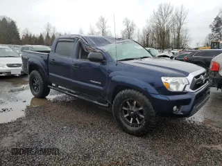 2013 Toyota Tacoma with VIN 3TMLU4EN4DM115071, listed as a Copart auction lot 45423005 with 130,792 mi miles and Salvage Title. Bid and sale history available at DreamBid. Image 4.