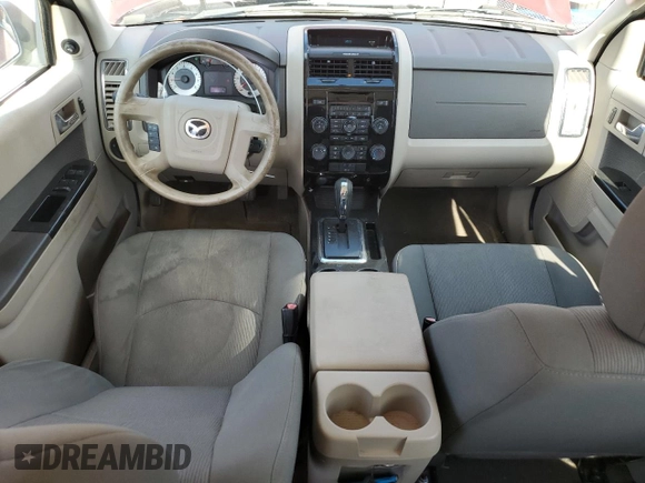 2011 Mazda Tribute Touring with VIN 4F2CY0C7XBKM00671, listed as a Copart auction lot 75431144 with 140,748 mi miles and Clean Title. Bid and sale history available at carsss.com. Image 8.