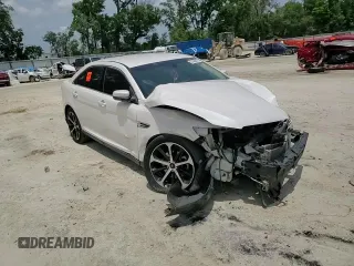 2016 Ford Taurus SEL z VIN 1FAHP2E86GG138691, wystawiony jako Copart lot #57495575 z przebiegiem Nie podano mil oraz Szkoda całkowita • Salvage title. Historia ofert i sprzedaży dostępna na DreamBid. Obrazek 14.