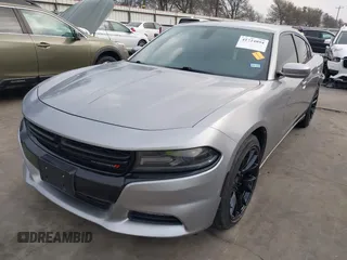 2015 Dodge Charger SXT with VIN 2C3CDXHG4FH884058, listed as a IAAI auction lot 41724894 with 202,701 mi miles and . Bid and sale history available at DreamBid. Image 19.
