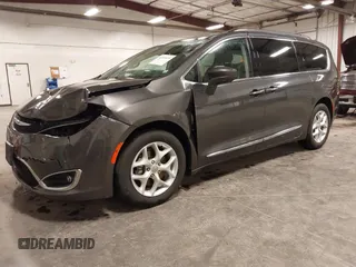 2017 Chrysler Pacifica Touring L with VIN 2C4RC1BG5HR803306, listed as a IAAI auction lot 41968455 with 84,714 mi miles and . Bid and sale history available at DreamBid. Image 20.