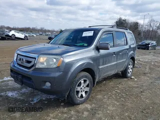 2011 Honda Pilot Touring with VIN 5FNYF4H98BB016012, listed as a IAAI auction lot 41634844 with 202,160 mi miles. Bid and sale history available at carsss.com. Image 17.