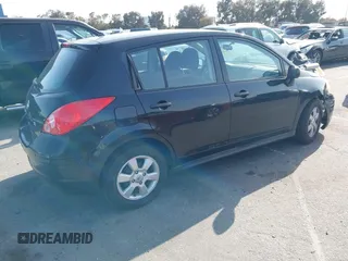 2009 Nissan Versa 1.8 SL with VIN 3N1BC13E79L406566, listed as a IAAI auction lot 41900375 with 109,470 mi miles. Bid and sale history available at carsss.com. Image 4.