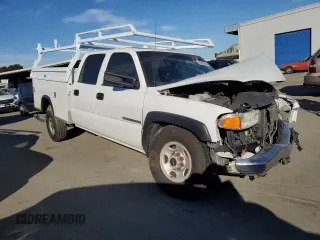 2005 GMC Sierra 1500 with VIN 1GDHC23215F894447, listed as a Copart auction lot 85680264 with 270,936 mi miles and Salvage Title. Bid and sale history available at DreamBid. Image 4.