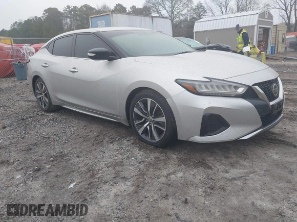 2019 Nissan Maxima Platinum z VIN 1N4AA6AV6KC372254, wystawiony jako IAAI lot #41519515 z przebiegiem 124 326 mil mil oraz . Historia ofert i sprzedaży dostępna na DreamBid. Obrazek 1.