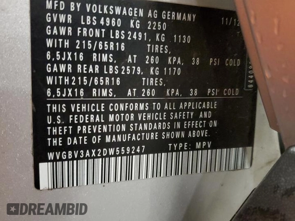 2013 Volkswagen Tiguan SE z VIN WVGBV3AX2DW559247, wystawiony jako Copart lot #57121375 z przebiegiem 171 171 mil mil oraz Czysty tytuł • Clean title. Historia ofert i sprzedaży dostępna na DreamBid. Obrazek 13.