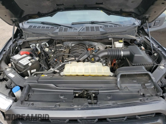 2023 Ford F-150 XL with VIN 1FTEW1C59PFC27499, listed as a Copart auction lot 54453255 with 58,554 mi miles and Salvage title. Bid and sale history available at DreamBid. Image 11.