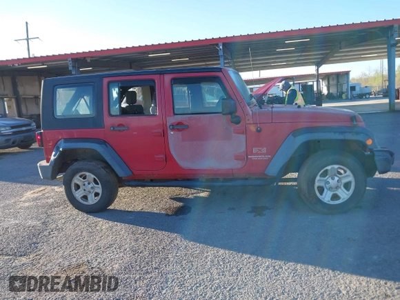2009 Jeep Wrangler Unlimited X with VIN 1J4GZ39179L763057, listed as a IAAI auction lot 41829248 with 151,018 mi miles. Bid and sale history available at carsss.com. Image 13.