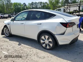 2020 Tesla Model Y Long Range z VIN 5YJYGDEEXLF043910, wystawiony jako Copart lot #54007745 z przebiegiem 102 974 mil mil oraz Szkoda całkowita • Salvage title. Historia ofert i sprzedaży dostępna na DreamBid. Obrazek 2.