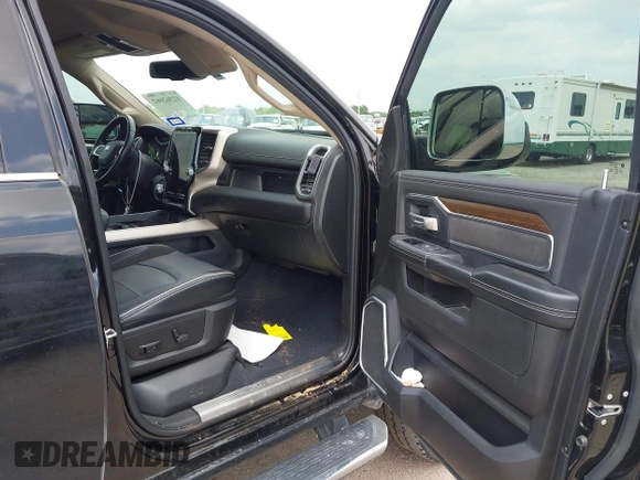 2022 Ram 2500 Laramie with VIN 3C6UR5FJ2NG305658, listed as a IAAI auction lot 42362662 with 50,701 mi miles and . Bid and sale history available at DreamBid. Image 5.